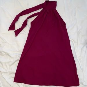 maroon sleeveless dress.